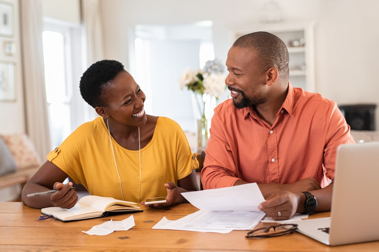 Driver reviewing loan paperwork before switching providers